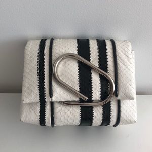 Alix mini clutch in black & white snake skin